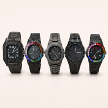 Five black embellished quartz watches in distinct dial styles, front group view