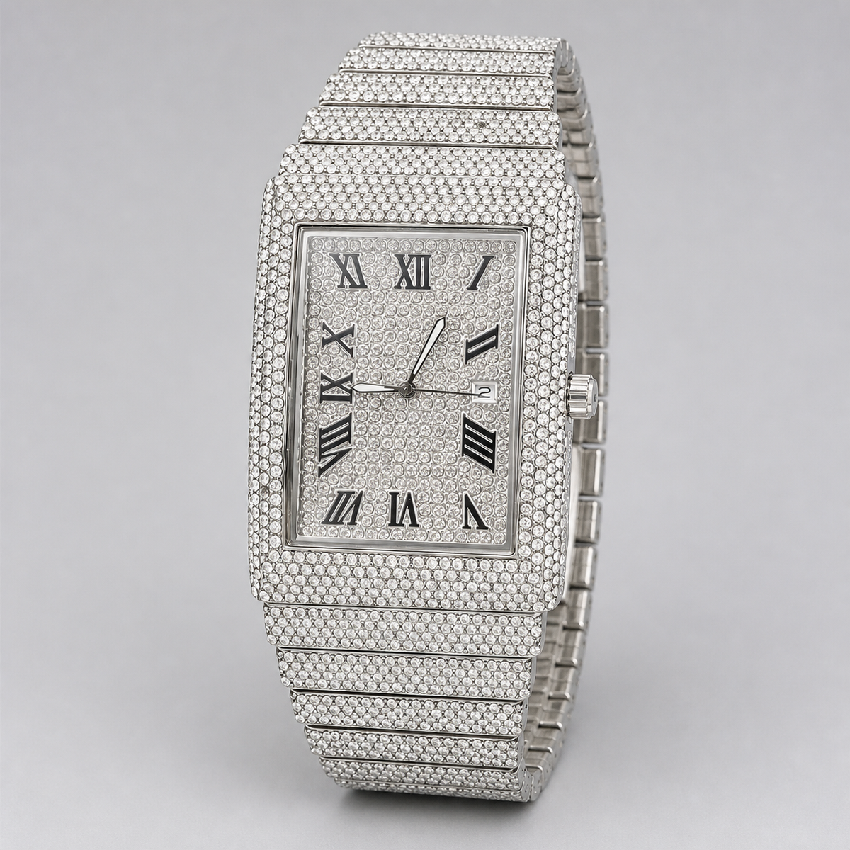 Three-quarter view of silver-tone rectangular watch with Roman numeral dial and date window
