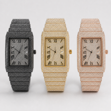 Black, gold-tone and rose-gold-tone rectangular watches with Roman numeral dials