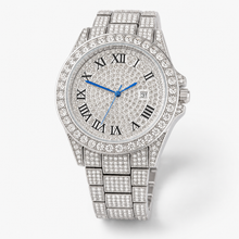 Silver-tone round quartz watch with blue hands and Roman numerals, slightly angled front view
