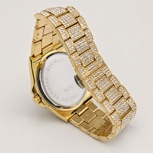 Rear view of the gold-tone round watch with crystal-set bracelet