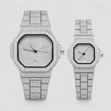 Silver-tone octagonal quartz watches for him and her, displayed side by side
