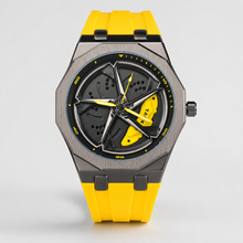 Men’s octagonal quartz watch with a yellow silicone strap and yellow turbine-motif dial, front view