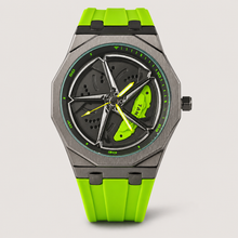 Men’s octagonal quartz watch with a lime-green silicone strap and turbine-motif dial, front view