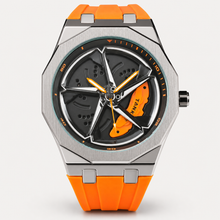 Men’s octagonal quartz watch with an orange silicone strap and orange turbine-motif dial, front view