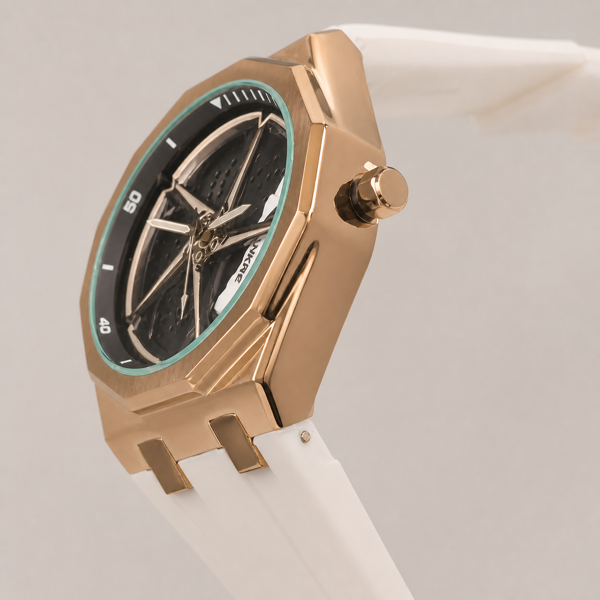 Side profile of the white-strap octagonal watch showing the case and crown