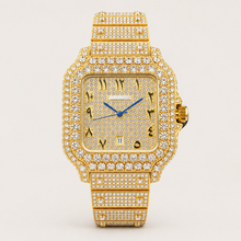 Gold-tone square watch with clear decorative border accents, front view