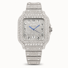 Silver-tone square watch with blue hands and a sparkling patterned dial, front view