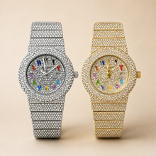 Silver-tone and gold-tone crystal-set watches with multicolour numeral markers, comparison view