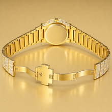 Gold-tone crystal-set watch with open deployant clasp and plain rear caseback