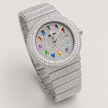 Silver-tone crystal-set watch with multicolour numeral markers and date window, straight front view