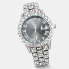 Silver-tone watch with light black Roman-numeral dial, close front view
