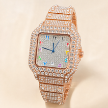 Rose-gold-tone crystal-set square watch with multicolour numeral markers, three-quarter front view