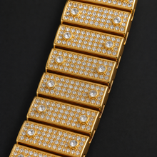 Gold-tone crystal-set watch bracelet with pavé links, detail view